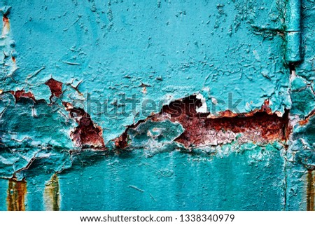 Background texture relief structure age-related changes in metal corrosion chipped cracking, shelling cracking rusty pieces peeling erosion of exfoliating green paint with white inserts wall surface. Royalty-Free Stock Photo #1338340979