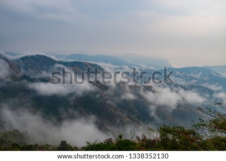 Beautiful scenary of mist with mountain range