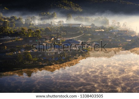 The villages and lakes are very foggy. In the morning at the Thai Rak village in Mae Hong Son province of Thailand.