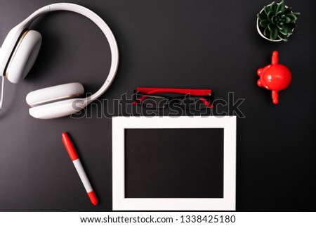 Mockup, Photo Frame, Headphones, Glasses, Pen, and Cactus. Red and Write object on Black background