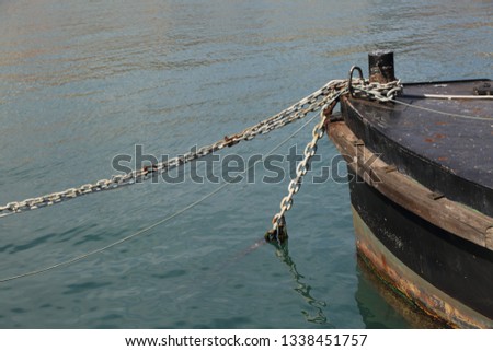 old chain in the sea