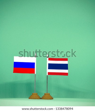 Russia and Thailand Thailand flag with light green background