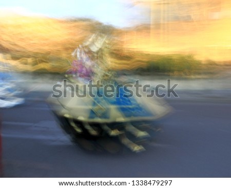 Tribute to Ernst Hass, Tribute to Monet, impressionist photograph of the people disguised in a carnival parade of Toledo, Spain, at low speed, photographic sweep , sensations of rhythm and movement,