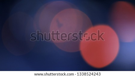Defocused, blurred bokeh and abstract blurry of red taillights moving on night street. Royalty high-quality free stock photo image of colorful red light in night, glowing backdrop overlay for design