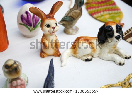 Knick knacks of easter bunny, egg and dog with others in a store