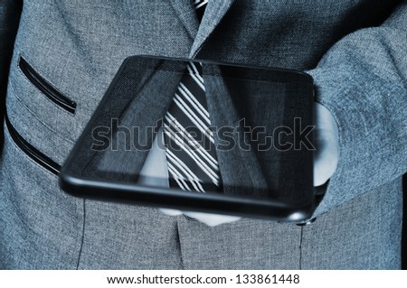 detail of a businessman using a tablet computer