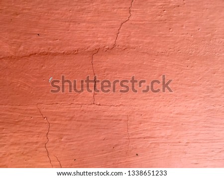 Vintage red cement wall background