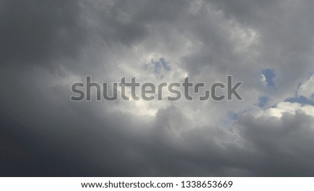 fluffy clouds in sky 