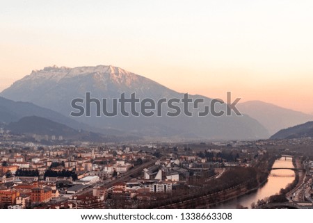 Beautiful sunset over Trento, Italy. Royalty-Free Stock Photo #1338663308