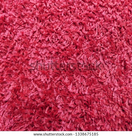 Red synthetic fabrics background