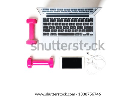Flat lay to composition with fitness equipment pink dumbbels, computer, mobile phone, headphones on white background. Sport, office, lifestyle concept . Copy space, top view. Isolated