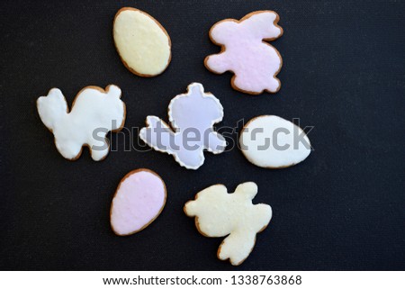 Homemade Easter gingerbreads decorated with colored icing made using natural dyes