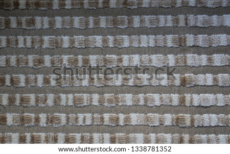 Texture beige fabric with a pattern strips. A background for a web design , it is possible to use for wall-paper.