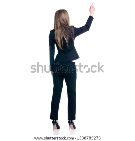 Business woman showing pointing on white background isolation, back view