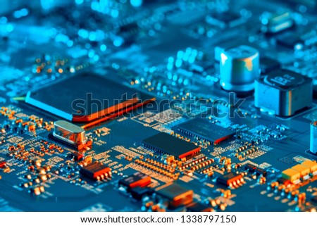 Electronic circuit board close up. Royalty-Free Stock Photo #1338797150