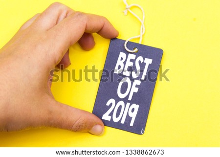 closeup hand holding tag with best of 2019