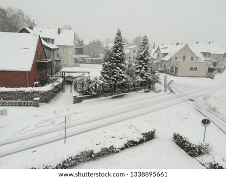 
great winter picture of a small village. Everything is snowy