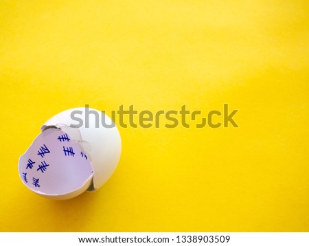 A broken egg with a countdown inside it. Concept of freedom Royalty-Free Stock Photo #1338903509