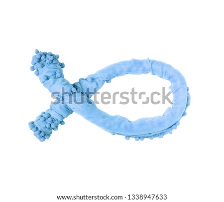 Christian symbol fish blue of twisted delicate fabric isolated on white background.
