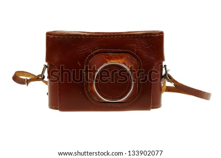 Old camera with a brown leather cover isolated on white background