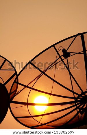 Satellite dish on sunset