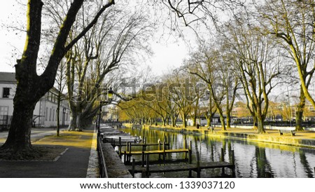 River Walk in Annecy France by the Canal with Boats and Trees next to the Lake
