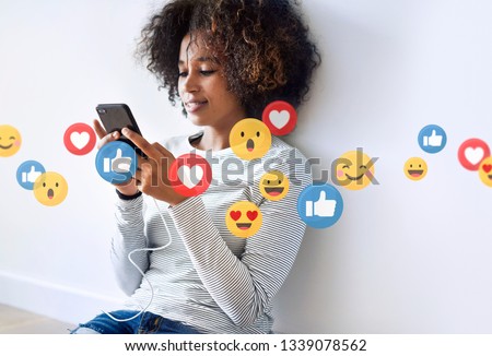 Girl watching a social media live stream Royalty-Free Stock Photo #1339078562