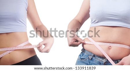 fat and thin woman measures the bellies Royalty-Free Stock Photo #133911839