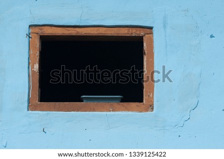 
Blue walls and hollow windows