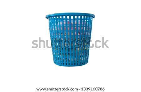 Clothes in a laundry wooden basket on white background