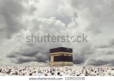 Mecca with dynamic clouds background Royalty-Free Stock Photo #1339215530