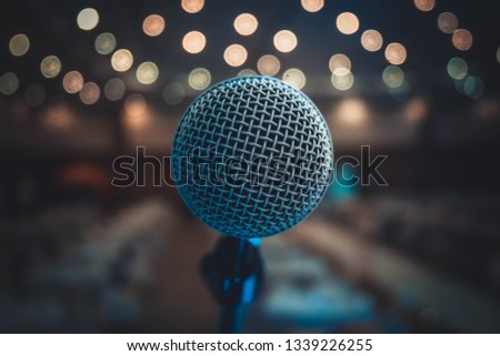 Close-up photos of the microphone on blurred light background