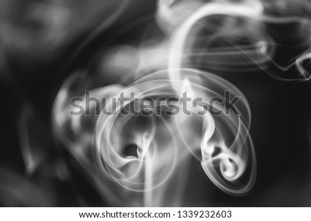 Abstract image of smoke from incense stick, closeup view