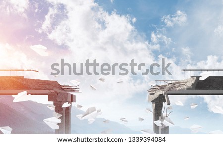 Broken concrete bridge with flying paper planes among high mountains and cloudly skyscape on background. 3D rendering.
