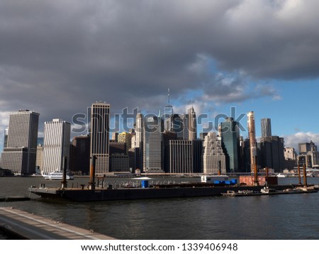 New York City Skyline, Manhattan. View from Brooklyn Heights, waterfront, winter day. 
