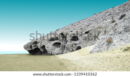 indiana Jones movie stage and the last crusade, tongues of lava eroded by the sea, the auto clastic gaps or pyroclastic andesite, The petrified wave, beach of Mónsul, Natural Park, Cabo de Gata, spain Royalty-Free Stock Photo #1339410362