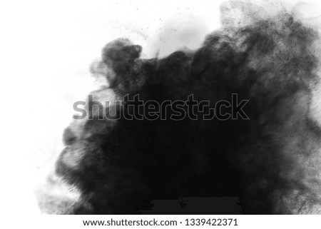  Black particles explosion isolated on white background. Abstract dust overlay texture.