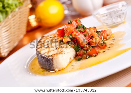 Fish with tomato