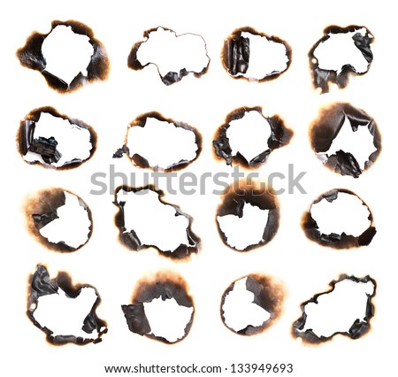 Collection of burnt holes in a piece of paper isolated on white background Royalty-Free Stock Photo #133949693