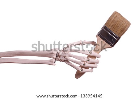 skeleton hand holding paint brush
