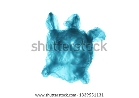 Pollution of the environment of the planet plastic. Blue plastic bag in the shape of turtle in the world ocean. Isolated on white background.