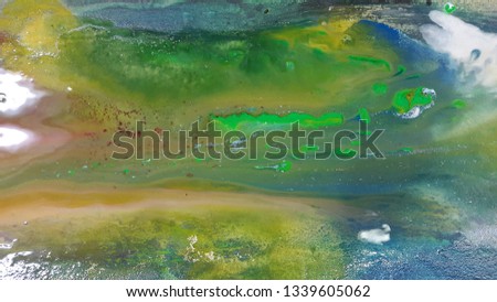 Mixed paint. Multicolored strokes and streaks. Artistic background. Abstract patterns. Vintage photo