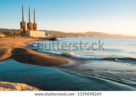 besos river estuary landscape of badalona  with "tres xemeneies"  from in the early morning at sunrise from barcelona side Royalty-Free Stock Photo #1339698269