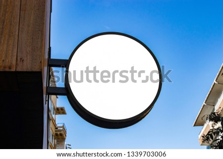 Signboard mockup and template empty frame for logo and text on the city wall  background
