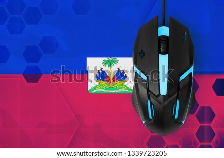 Haiti flag  and computer mouse. Concept of country representing e-sports team