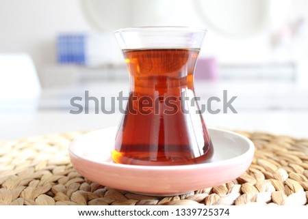 Turkish tea in glass cup. Royalty-Free Stock Photo #1339725374