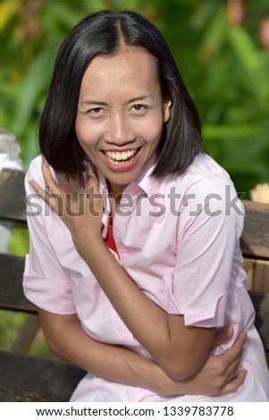 Beautiful Filipina Adult Female Laughing