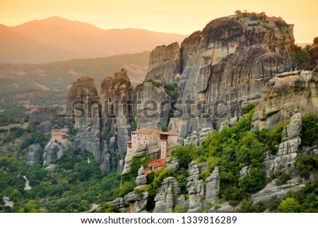 Panoramic view of Meteora valley, a rock formation in central Greece hosting one of the largest complexes of Eastern Orthodox monasteries, built on immense natural pillars. UNESCO World Heritage site.