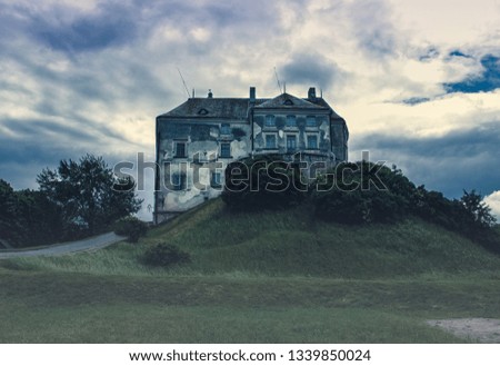 ancient castle on a green hill
