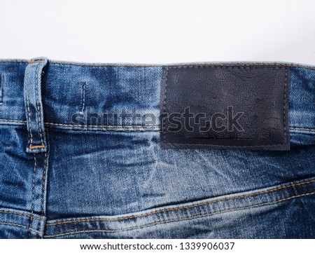 back of blue jeans as background
